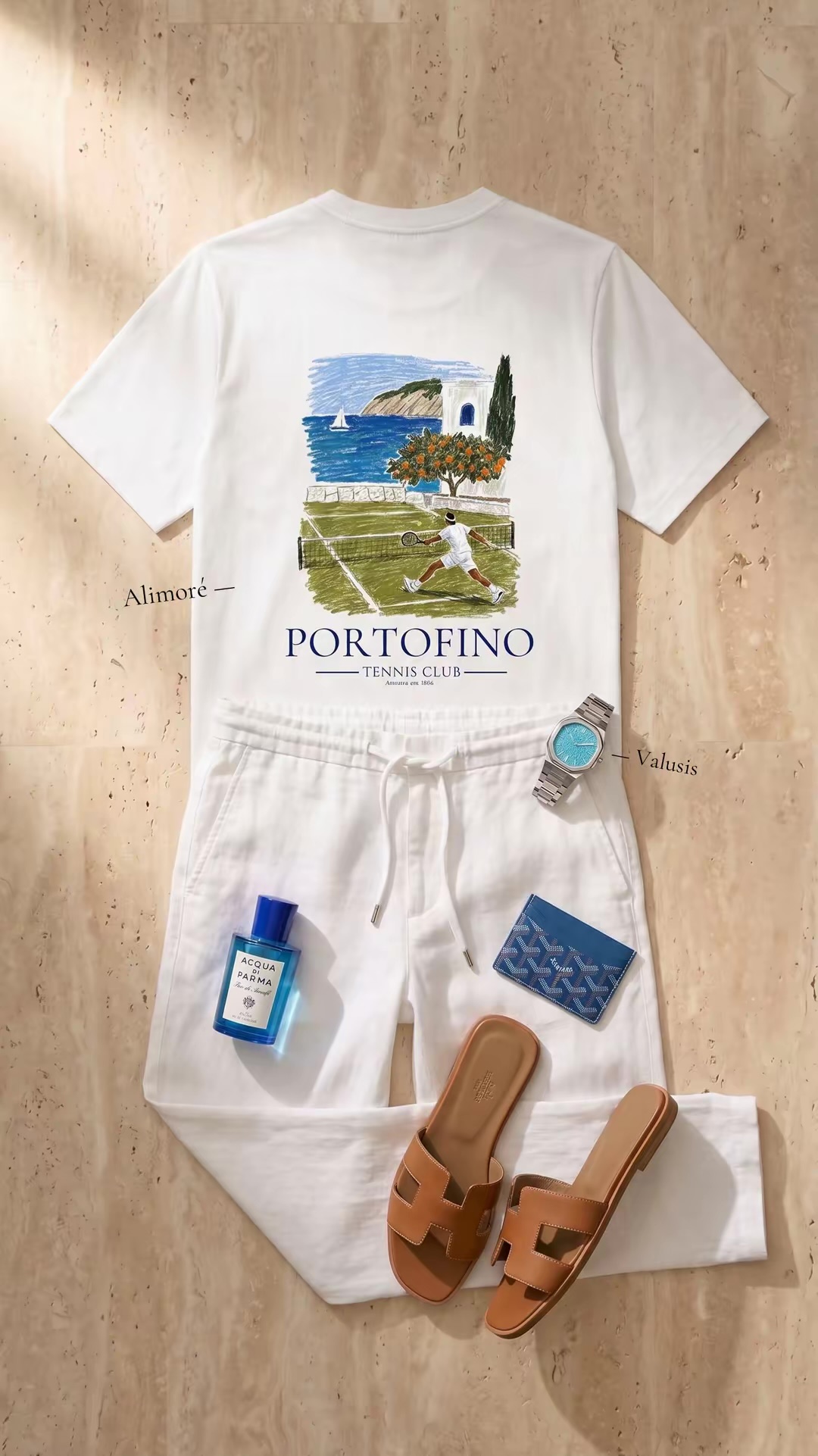 Flat-lay: Alimoré Portofino Tennis Club tee, white shorts, Valusis watch and Hermès sandals